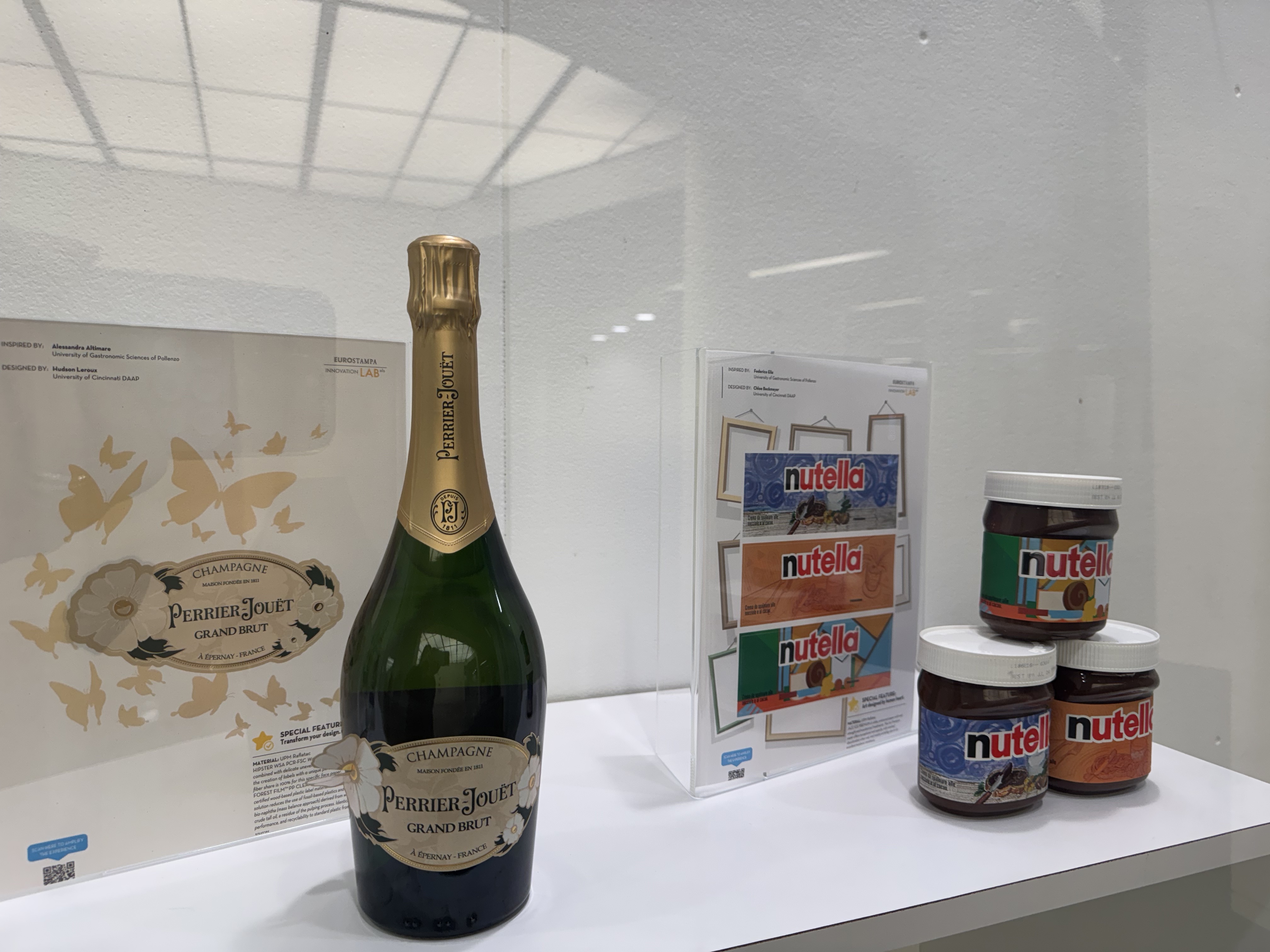 Close up of wine bottle and nutella items on display